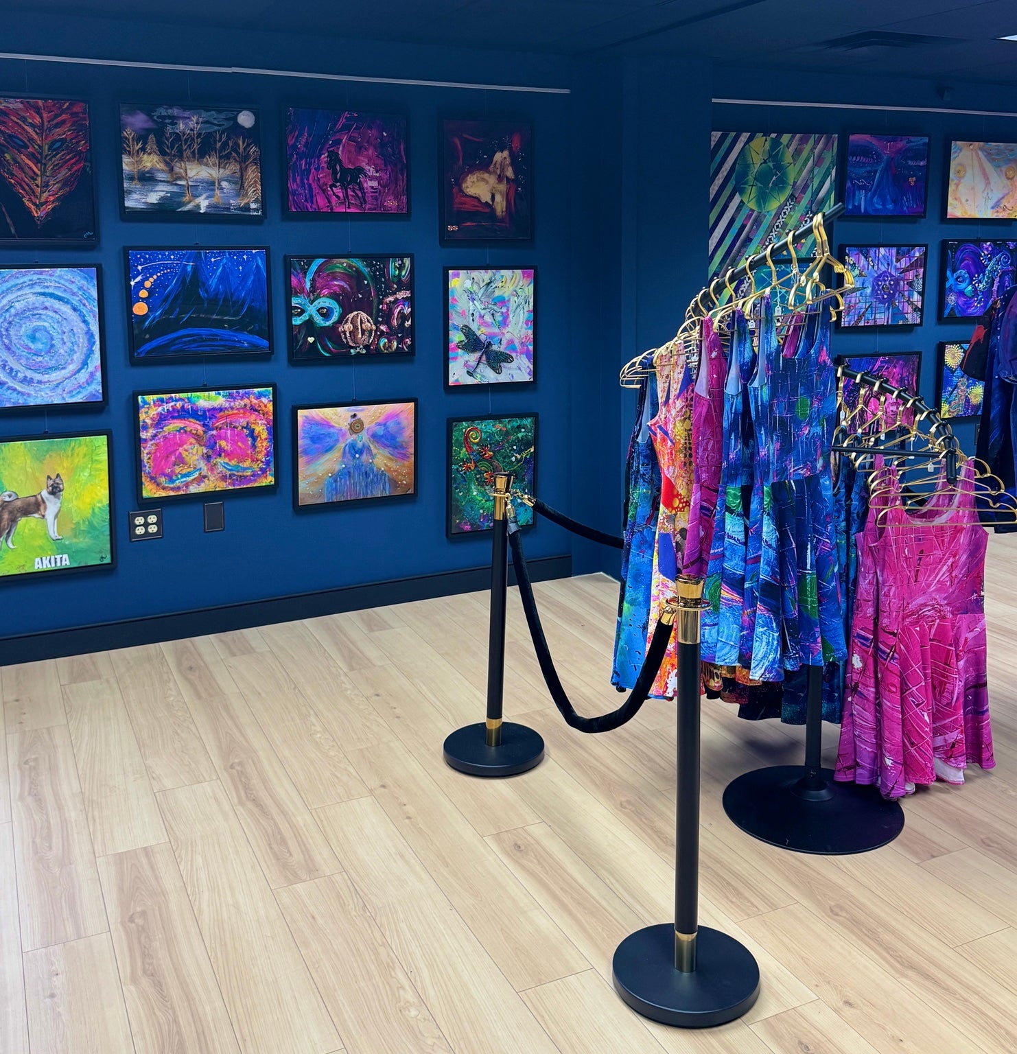 Interior of Heartwork Studios showing colorful artwork and clothing displays